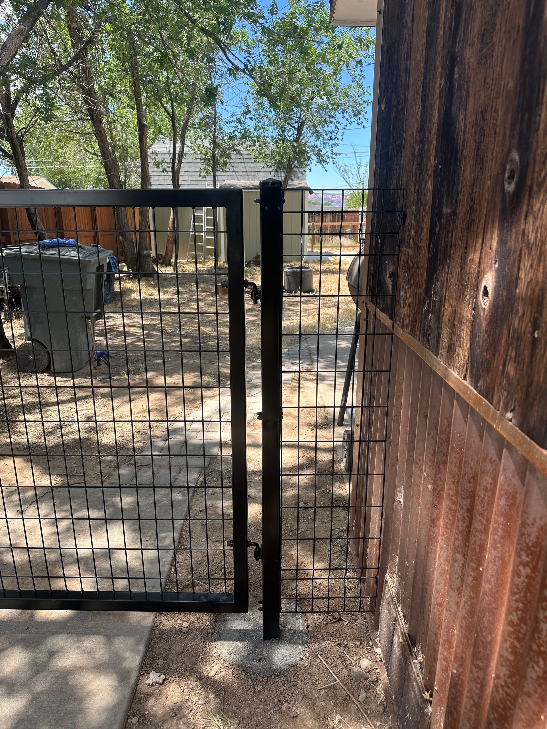 Gallery photos for Modern Black Welded Wire Fence with Gates Installed: Image #6